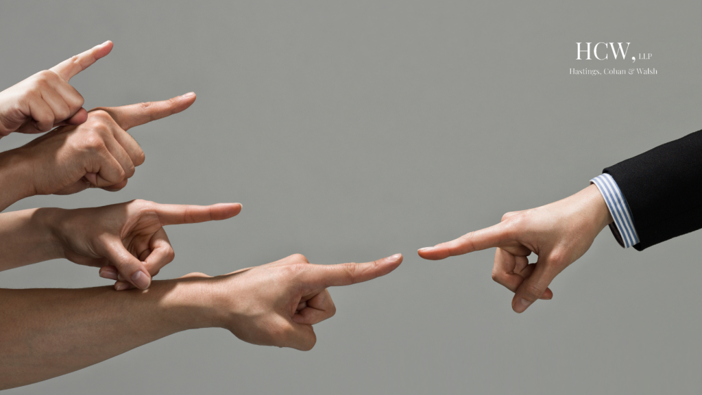 Multiple hands pointing fingers symbolizing insurance companies blaming motorcyclists after Connecticut motorcycle accidents